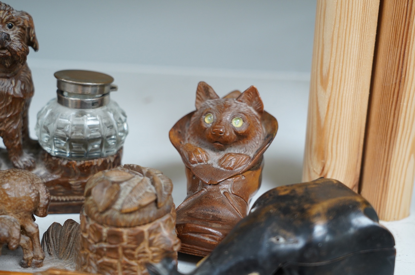 A collection of five carved wooden novelty animal inkwells, four black forest, tallest dog inkwell 15cm high. Condition - some small chips but fair